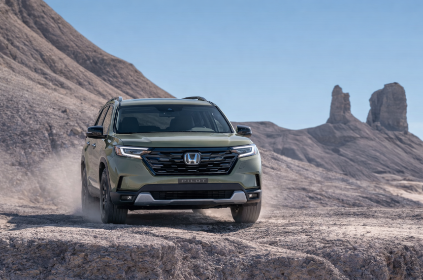 2026 Honda Pilot SUV in sleek exterior, showcasing modern headlights and spacious interior