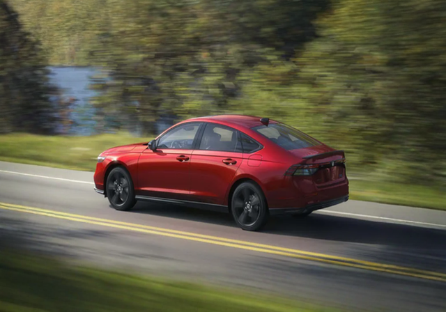 2026 Honda Accord sedan in metallic silver, showcasing updated exterior design with sleek headlights and modern styling, now available at dealerships.