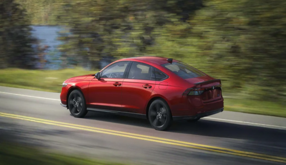 2026 Honda Accord sedan in metallic silver, showcasing updated exterior design with sleek headlights and modern styling, now available at dealerships.